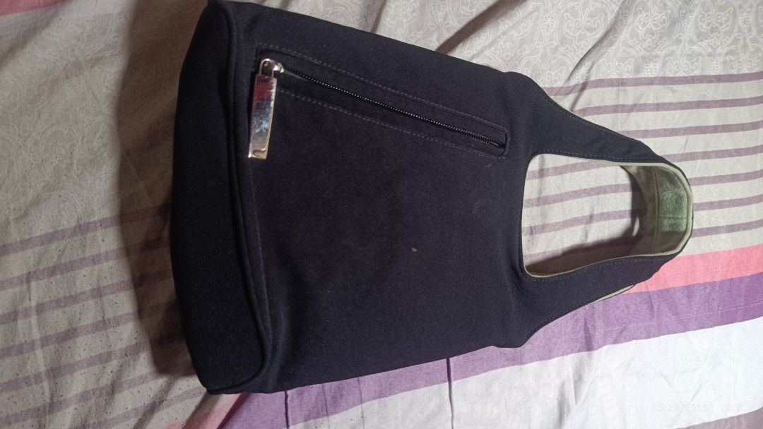 Salvatore Ferragamo Black Handbag (Category: Luxury Bags & Wallets) located in Rizal. Submitted by simplygoodthingsmel (Listing ID 1429801590, Image 3). Description: hand bag type.