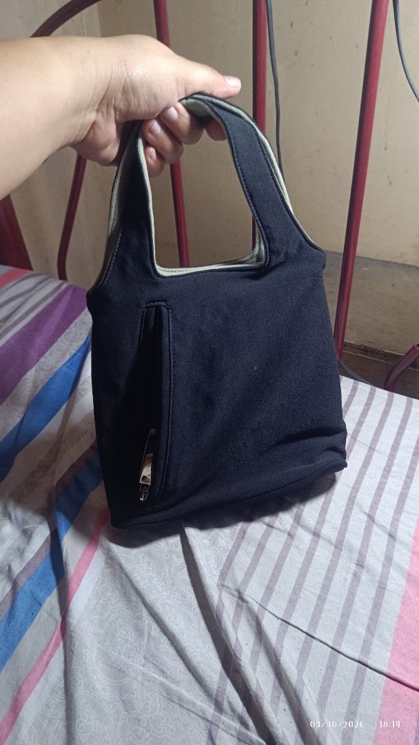 Salvatore Ferragamo Black Handbag (Category: Luxury Bags & Wallets) located in Rizal. Submitted by simplygoodthingsmel (Listing ID 1429801590, Image 1). Description: hand bag type.