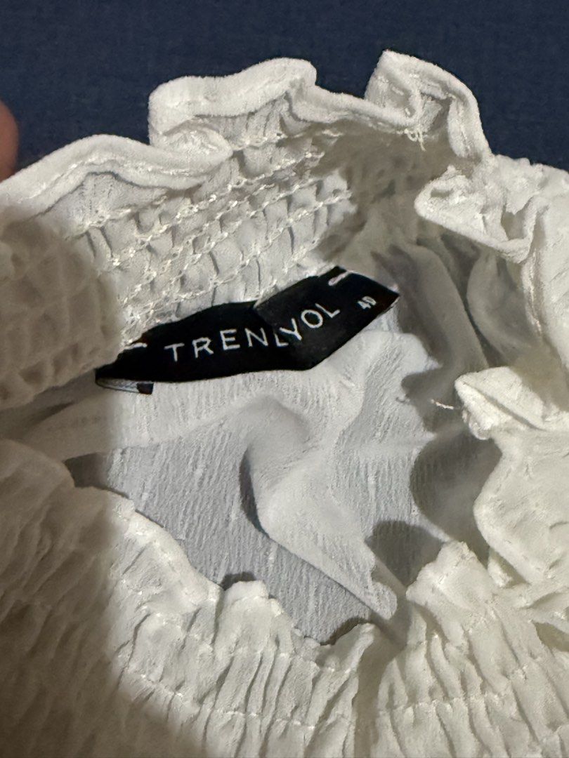 Sheer white high-neck blouse from Trendyol (Category: Blouses) located in Quezon City. Submitted by ayahko (Listing ID 1429807483, Image 3). Description: Trendyol sheer white high neck blouse with smocked cuffs, size 40 (fits medium to large frames) Great with a tube or tank underneath It's giving BTS/Jimin—cool piece for styling for the Arirang concerts!.