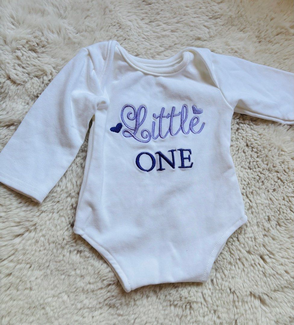 Shein Little One Outfit (Category: Babies & Kids Fashion) located in Batangas. Submitted by aveena0413 (Listing ID 1429712599, Image 2). Description: Shein Little One Outfit – 0-3 Months (Onesie + Tutu Shirt) ✨ Brand: Shein 👶 Size: 0–3 months 👕 Includes: White onesie & violet tutu shirt 📦 Condition: Used once, in great condition 💜 Color combo: Classic white with pretty violet 🛍️ Perfect for: Newborn photos, special occasions, daily cute wear