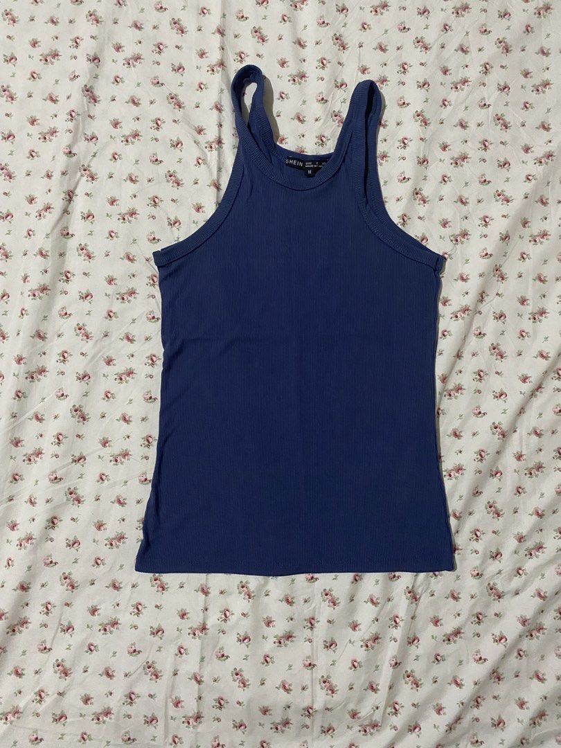 Shein Navy Blue Ribbed Tank Top (Category: Sleeveless) located in San Mateo. Submitted by katka_cat (Listing ID 1429785342, Image 2). Description: Navy blue ribbed tank top from Shein. Features a sleeveless design with a high neckline. The tank top is a size M. Perfect for casual wear or layering..