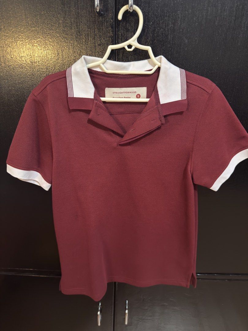 Straightforward Polo Shirt - Maroon (Category: Tshirts & Polo Shirts ) located in Paranaque City. Submitted by jayvee7 (Listing ID 1429675935, Image 1). Description: Maroon polo shirt from Straightforward. Features a white collar and sleeve trim. The shirt has a button-up neckline and is a size small. The shirt is a short-sleeved style. The brand tag is visible on the inside of the collar. Size Small RFS: Declutterring Only used once during Chris