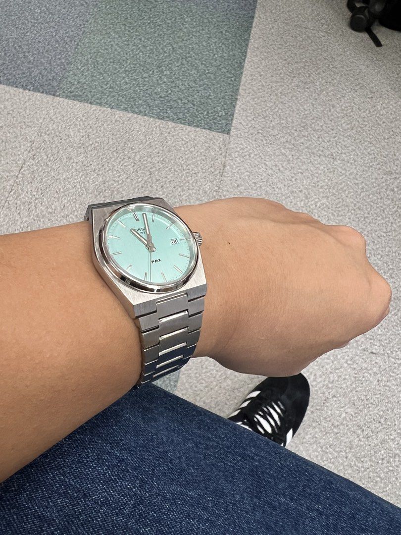 Tissot PRX 35mm “Tiffany” (Category: Luxury Watches) located in Pasig City. Submitted by itsmejaypee25 (Listing ID 1429040958, Image 3). Description: Tissot PRX 35mm Quartz Tiffany dial Complete set with box and manual RFS: seldom used Wears like a vintage Rolex Oysterdate.