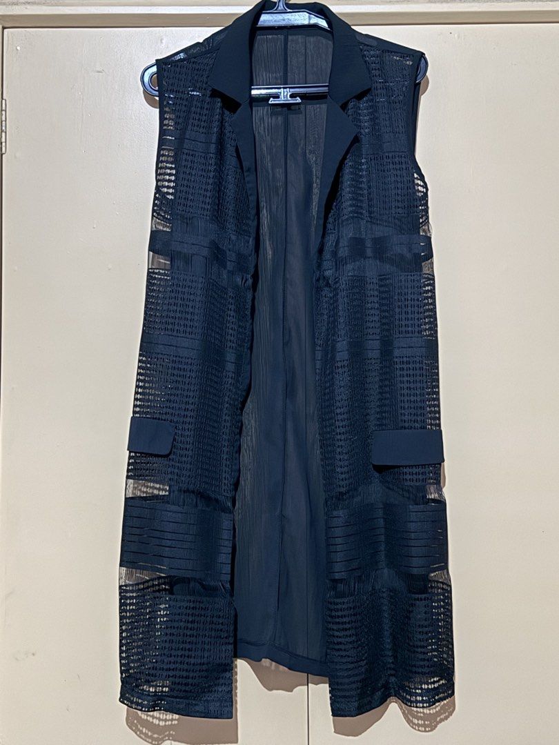 Una Rosa long black sheer vest (Category: Others Tops) located in Quezon City. Submitted by ayahko (Listing ID 1429749904, Image 1). Description: Lightly used sheer vest by Una Rosa in black, free size.