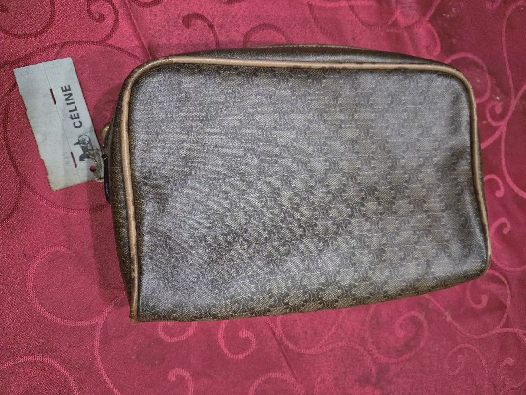 Vintage Celine Macadam Cosmetic Pouch (Category: Purses & Pouches) located in Quezon City. Submitted by gbabesy2.0 (Listing ID 1429759823, Image 1). Description: Bought sa Tokyo Japan Flea Market this March 2026. Sold as is, no authentication included kaya selling low. Vintage Celine cosmetic pouch in the classic Macadam pattern. Features a top zipper closure and a gold-tone Celine charm. The interior is lined with a dark material. Includes the o
