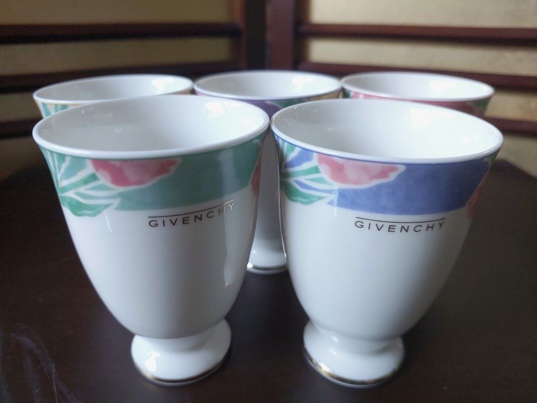 Vintage Givenchy Footed Porcelain Cup Set (Category: Coffee & Tea Tableware) located in Bulacan. Submitted by hnbfinds (Listing ID 1429725588, Image 2). Description: Elevate your table setting with this vintage Givenchy footed porcelain cup set. 🌸 Each of the five pieces features a unique, delicate floral rim and elegant gold-lined base, blending Parisian luxury with Japanese craftsmanship. Perfect for tea, juice, or simply as a stunning display