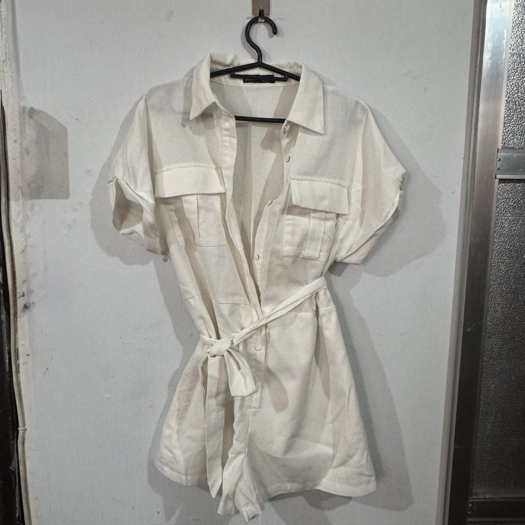 White Short Sleeve Romper with Belt (Category: Rompers) located in Makati City. Submitted by vbaude (Listing ID 1429743483, Image 1). Description: SHEIN ROMPER 🚚 Delivery: • Shipping via: Grabexpress / Lalamove (shipping fee shouldered by buyer) • Location: Metro Manila 💳 Payment: • GCash or Maribank 📍Notes: • Color may vary due to lighting • Please manage expectations for preloved items • No cancellations once reserved Disclaimer: Has yellow 