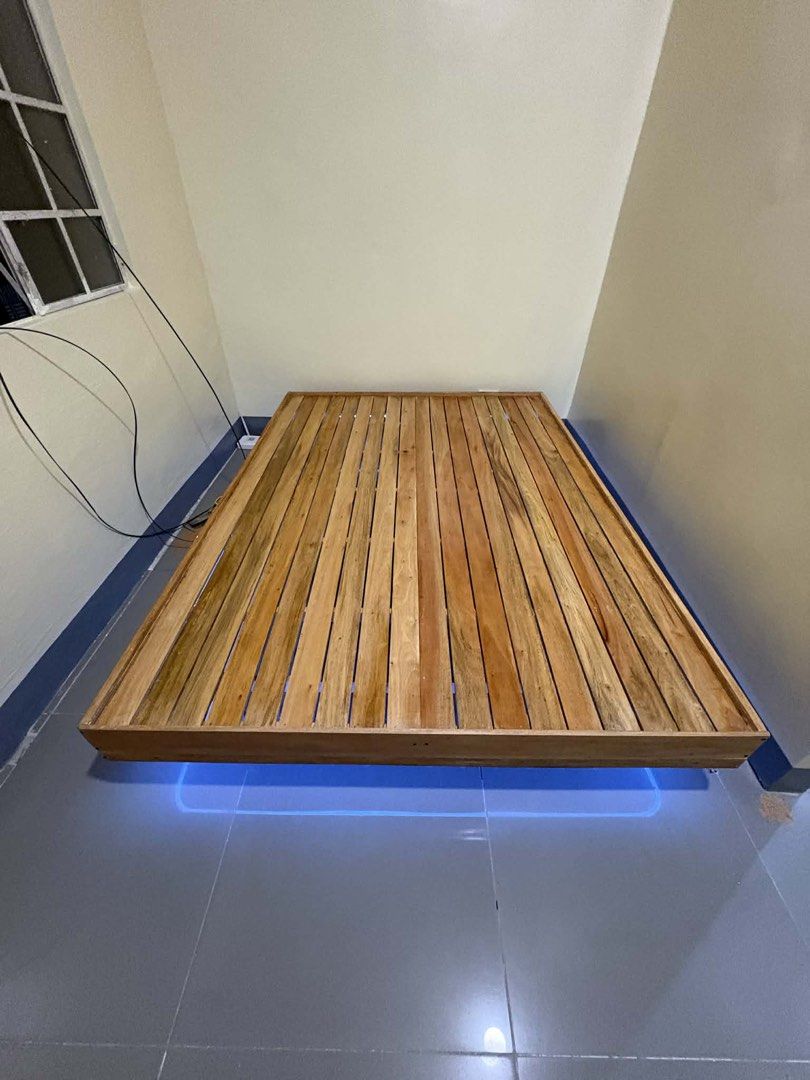 Wooden Floating Bed Frame with LED Lights (Category: Bed Frames & Mattresses) located in Manila. Submitted by shuri_19 (Listing ID 1429833805, Image 2). Description: Ikea inspired Pure mahogany wood Made to order.