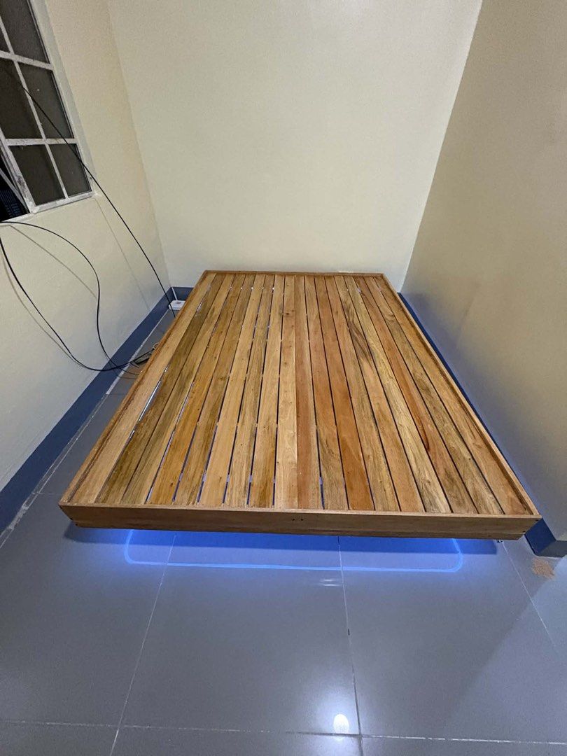 Wooden Floating Bed Frame with LED Lights (Category: Bed Frames & Mattresses) located in Manila. Submitted by shuri_19 (Listing ID 1429833805, Image 1). Description: Ikea inspired Pure mahogany wood Made to order.