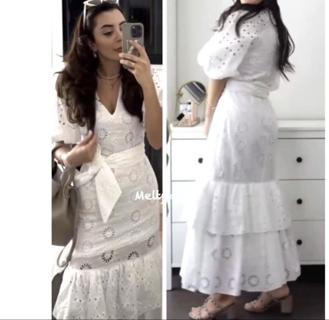 Zara White Eyelet Midi Dress (Category: Dresses) located in Cebu City. Submitted by i_van22 (Listing ID 1429805988, Image 2). Description: Zara Belted Embroidered Dress, specifically a white midi or maxi dress featuring broderie anglaise detailing, elbow-length puff sleeves, and a tiered ruffle skirt..