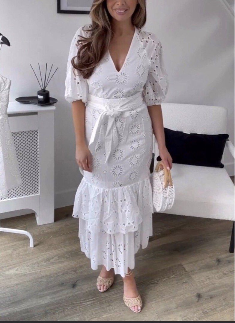 Zara White Eyelet Midi Dress (Category: Dresses) located in Cebu City. Submitted by i_van22 (Listing ID 1429805988, Image 1). Description: Zara Belted Embroidered Dress, specifically a white midi or maxi dress featuring broderie anglaise detailing, elbow-length puff sleeves, and a tiered ruffle skirt..