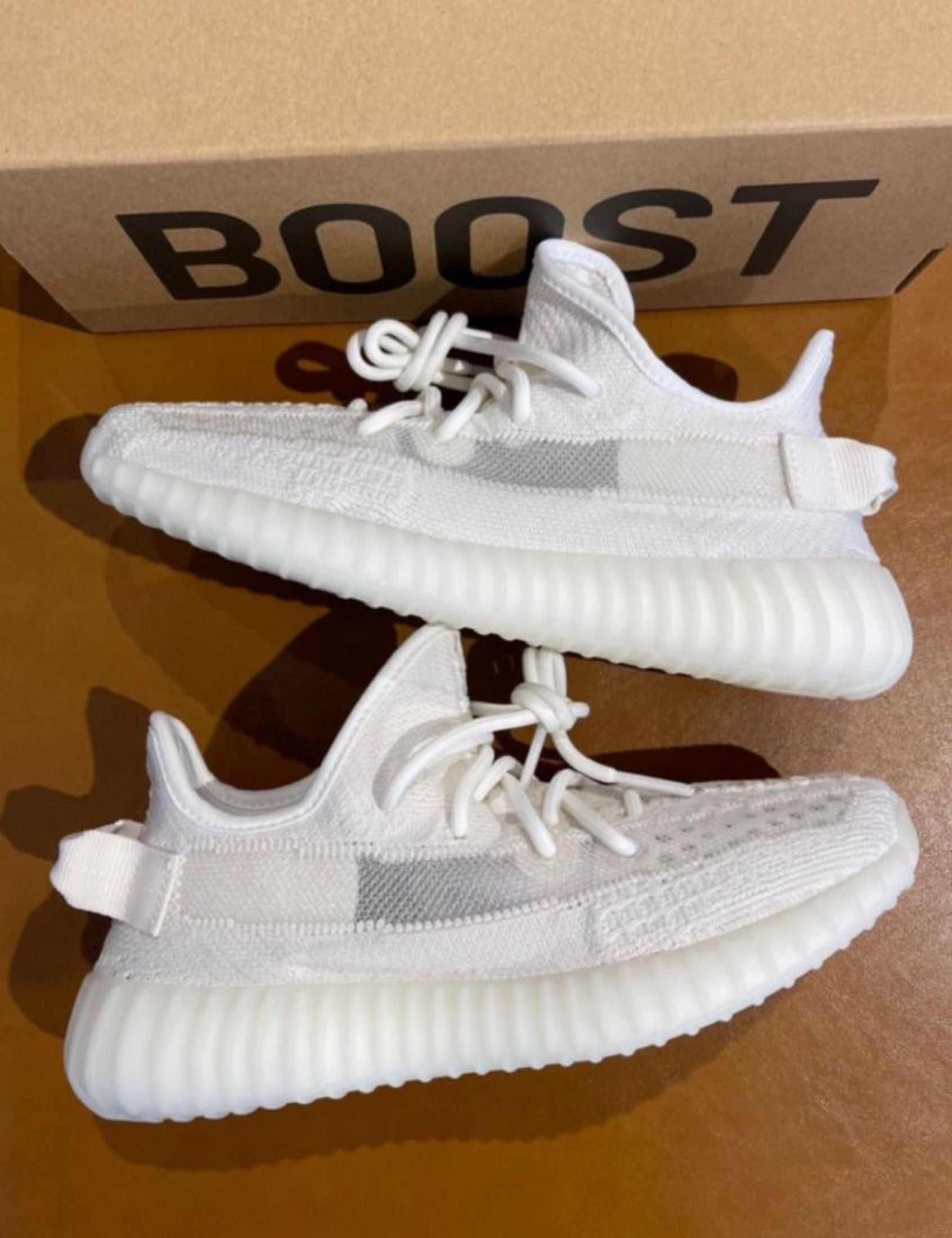 adidas originals Yeezy Boost 350 V2 Ice Cream Bone Fabric Shoes White (Category: Sneakers) located in Singapore. Submitted by coolforestyy (Listing ID 1433393853, Image 3). Description: ╔══════════════╗ Adidas Shop ╚══════════════╝ adidas originals Yeezy Boost 350 V2 Ice Cream Bone Fabric Shoes White • Brand New • Free Shipping • Cash on Delivery • 3-day Photo Confirm Chat for questions 💬.