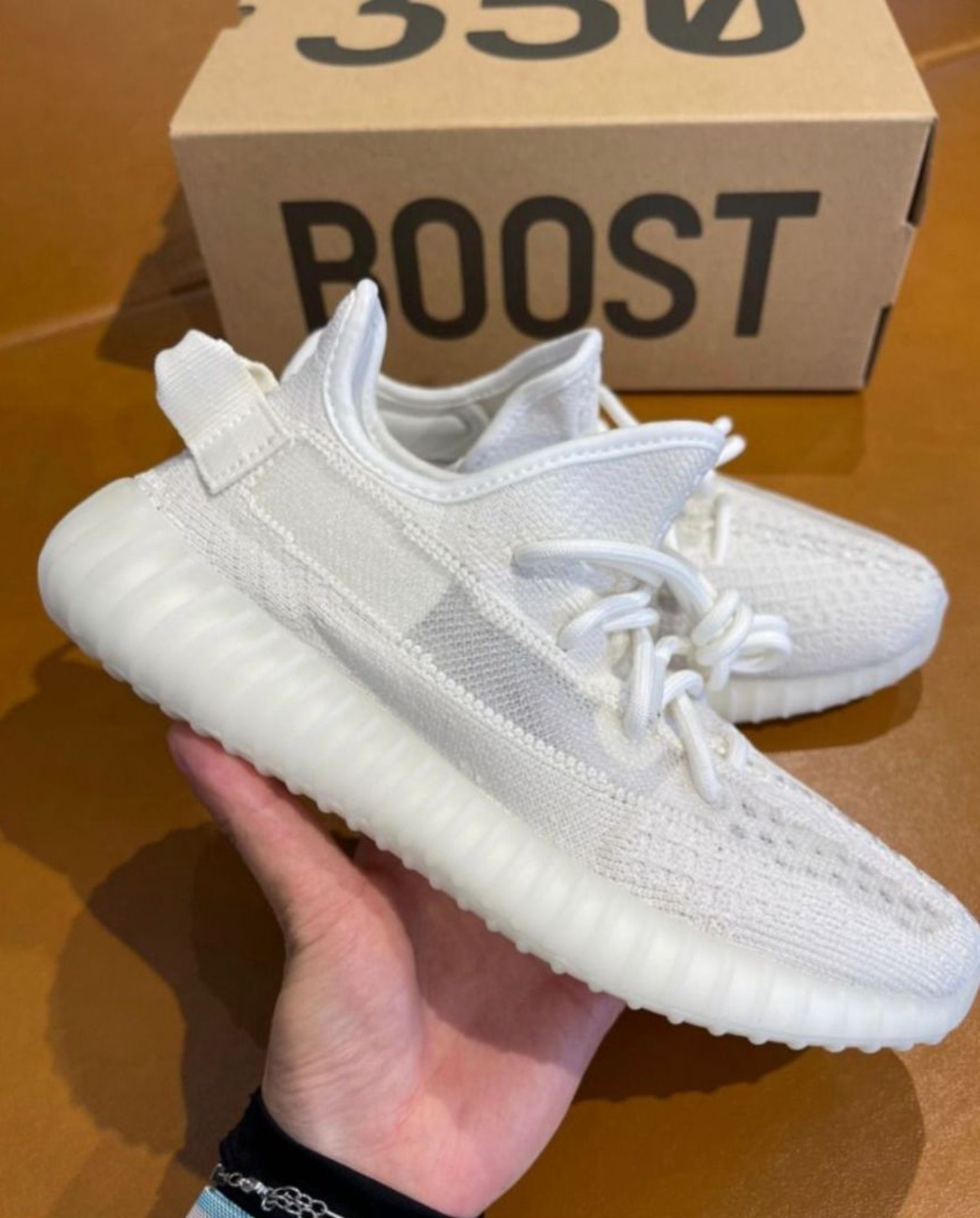 adidas originals Yeezy Boost 350 V2 Ice Cream Bone Fabric Shoes White (Category: Sneakers) located in Singapore. Submitted by coolforestyy (Listing ID 1433393853, Image 5). Description: ╔══════════════╗ Adidas Shop ╚══════════════╝ adidas originals Yeezy Boost 350 V2 Ice Cream Bone Fabric Shoes White • Brand New • Free Shipping • Cash on Delivery • 3-day Photo Confirm Chat for questions 💬.