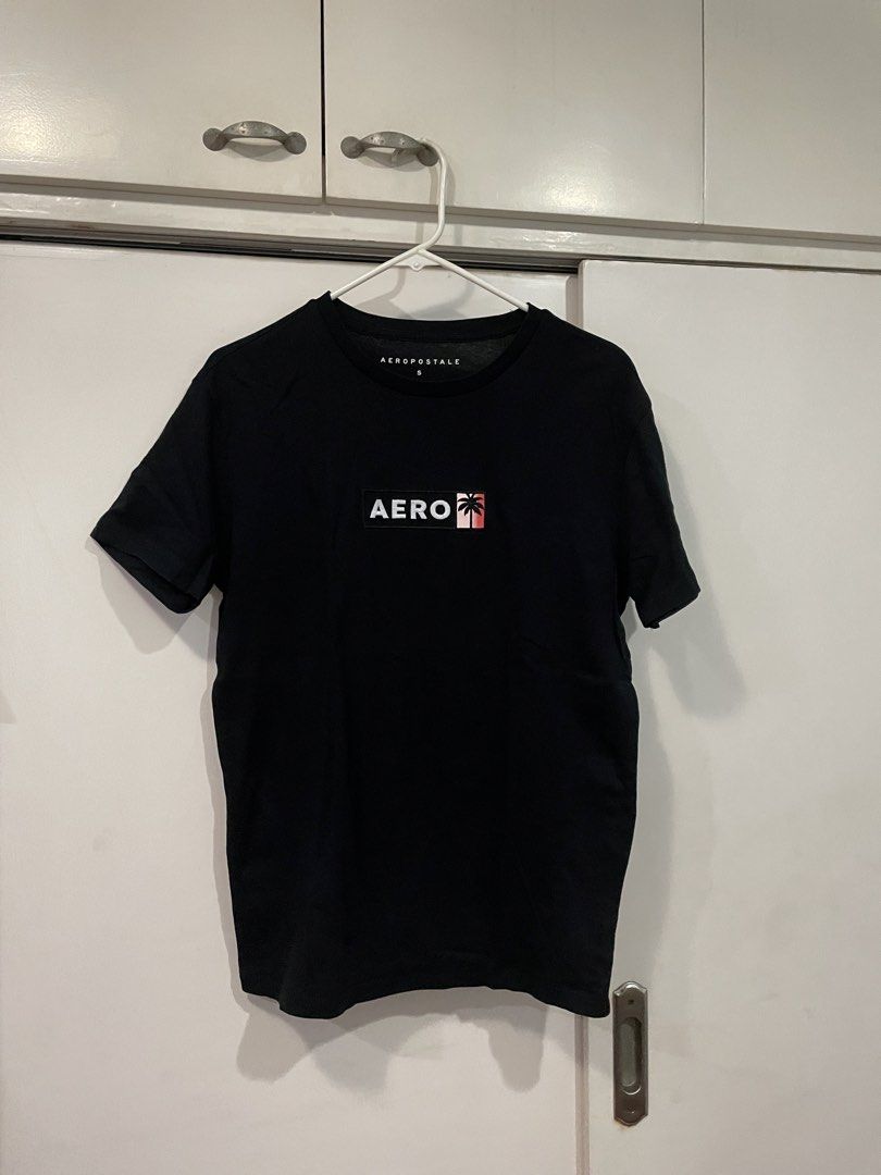 Aeropostale Black T-shirt (Category: Shirts) located in Makati City. Submitted by Pinksisters (Listing ID 1433359644, Image 1). Description: - Aeropostale black t-shirt - Size: Small but fits medium - Features a small logo on the front - Classic crew neck design - Short sleeves - Made in Indonesia.