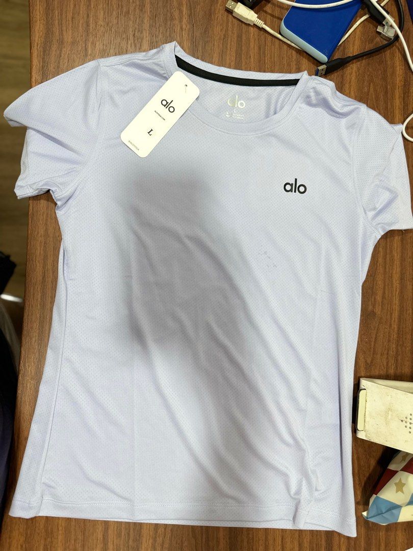 Alo Yoga Terry Beachside Short Sleeve T-Shirt - Lavender - L (Category: Activewear) located in Singapore. Submitted by mightygem.ff9f97 (Listing ID 1433239576, Image 1). Description: - Brand new Alo Yoga Terry Beachside Short Sleeve T-shirt - Color: Lavender - Size: L - Made in Vietnam - Lightweight and breathable fabric - Ideal for workouts or casual wear - Comes with original tags.