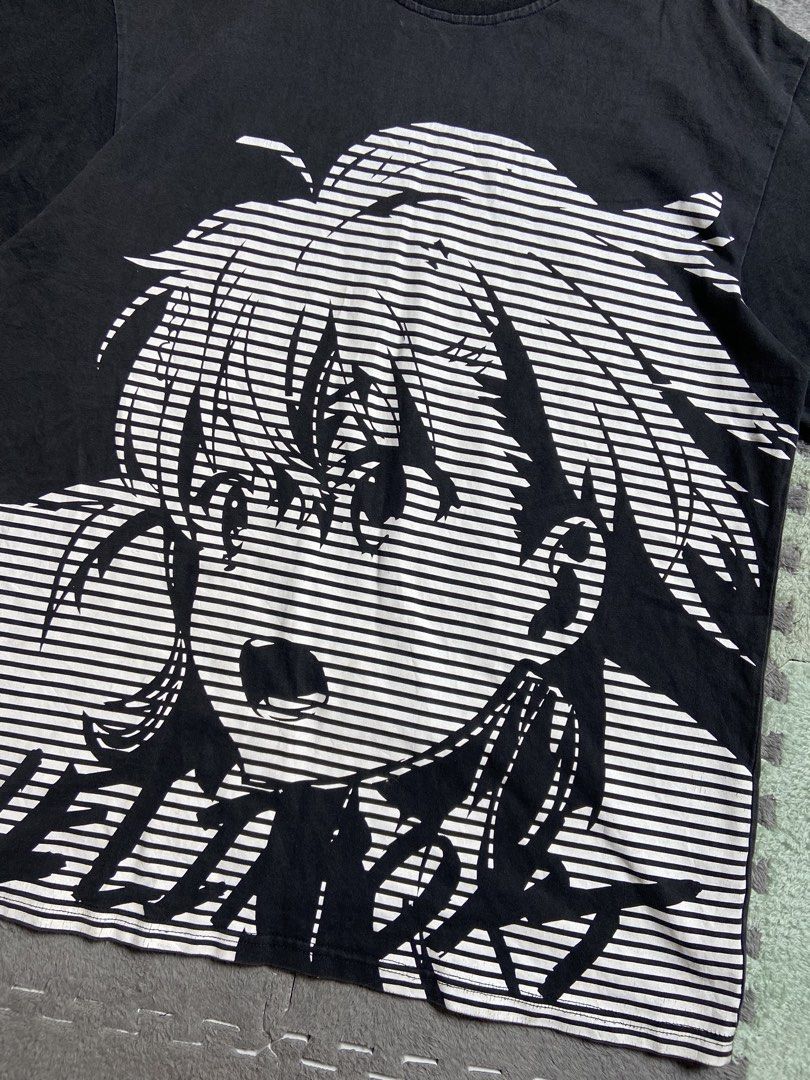 Anime Graphic Tee (Category: Tshirts & Polo Shirts ) located in Antipolo. Submitted by casmiro (Listing ID 1433318299, Image 2). Description: - Black graphic tee - Features an anime character design - White graphic on the front - Short sleeves - Crew neck - Standard fit.