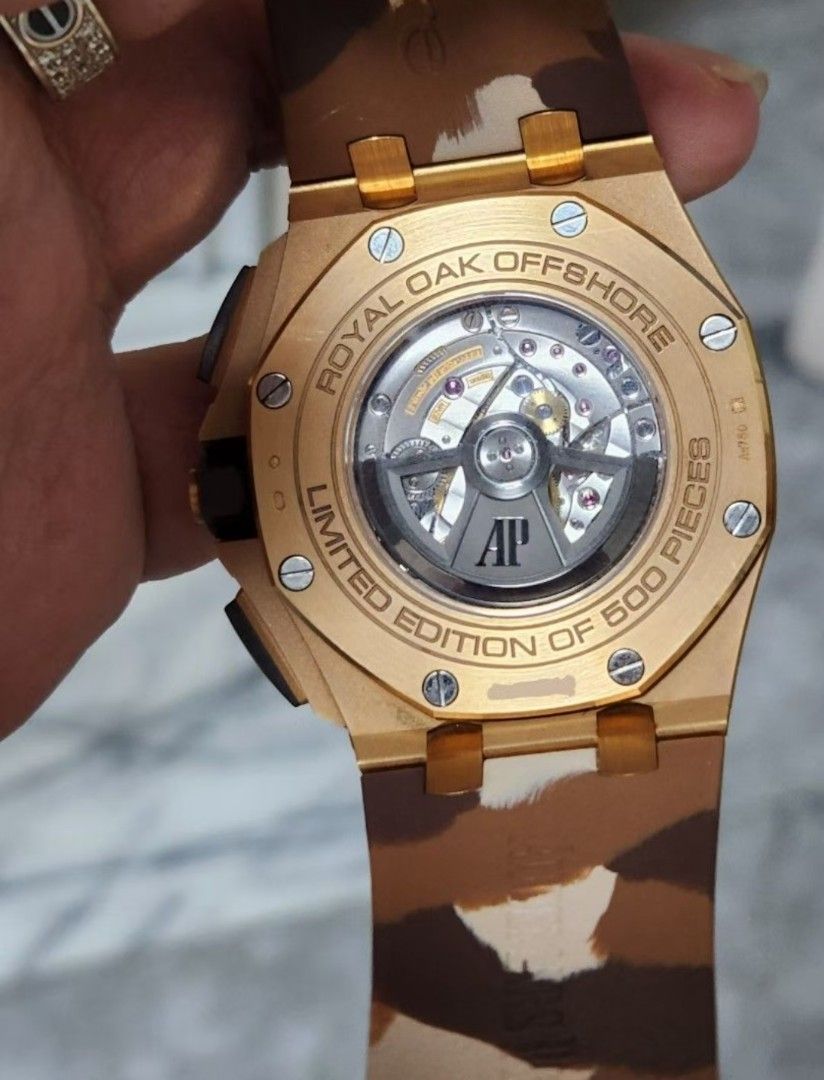 Audemars Piguet Royal Oak Offshore 2019 "Camouflage Rose Gold" 26401RO.OO.A087CA.01 (Category: Watches) located in Singapore. Submitted by poh.bryan.9 (Listing ID 1433328505, Image 3). Description: - Audemars Piguet Royal Oak Offshore Chronograph - Limited edition of 500 pieces - Includes original box and papers -upgraded to New Caliber 3840 - Comes with an extra strap - A must-have for collectors -Low baller don't bother to try not urgent sales.
