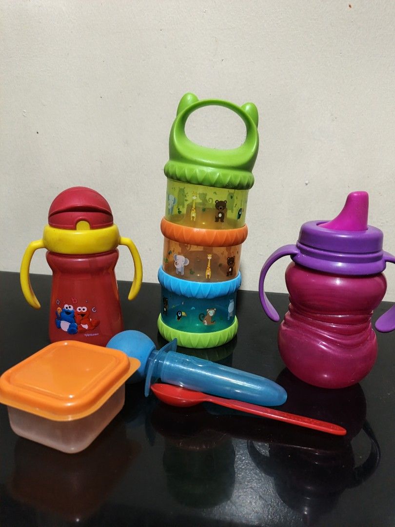 Baby Feeding Set - Sippy Cups, Snack Container, Spoon take all (Category: Weaning & Toddler Feeding) located in Marikina City. Submitted by andreah_16 (Listing ID 1433342096, Image 3). Description: - Includes two sippy cups (red and purple) with handles - Features a snack container - Comes with a colorful stacking container - Includes a spoon - Ideal for feeding your baby at home or while traveling.
