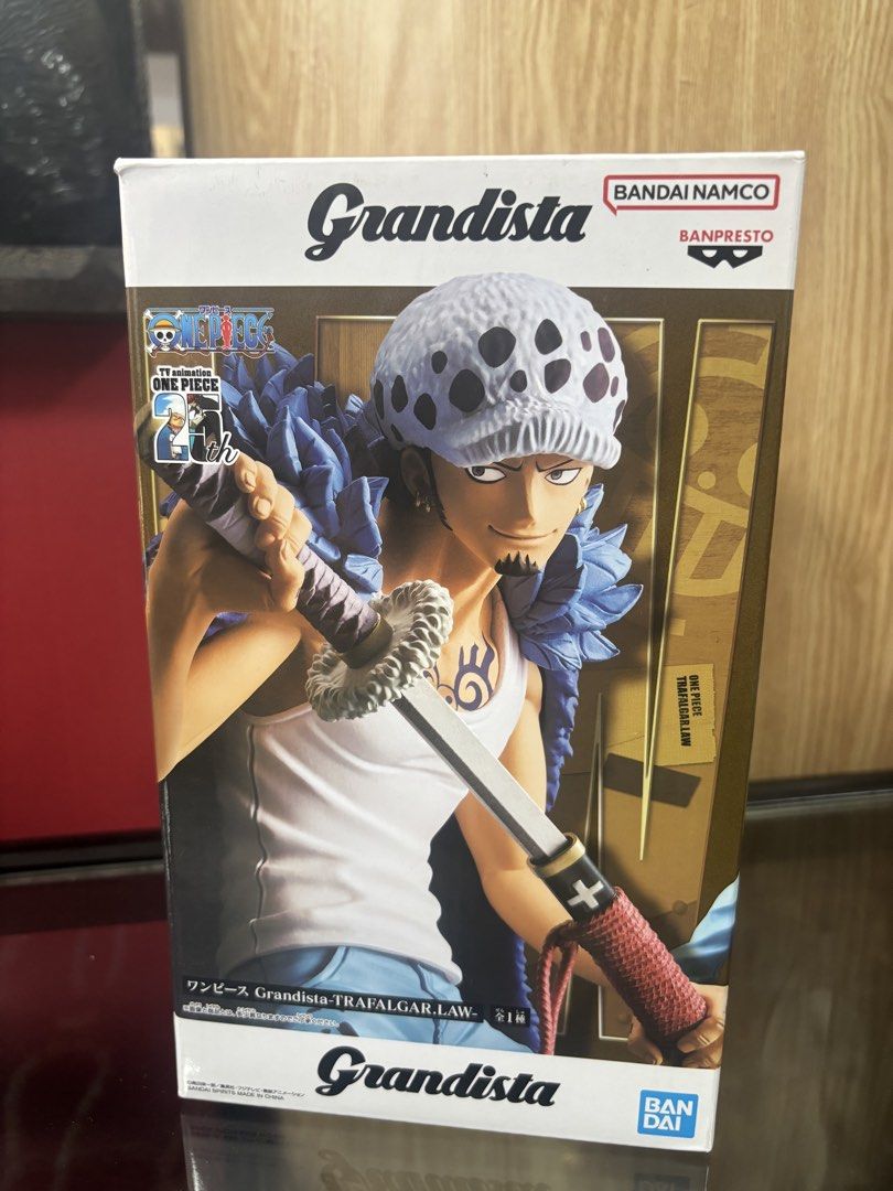 Bandai Grandista Trafalgar Law Figure (Category: Toy Figures) located in Singapore. Submitted by rachelzhan85416 (Listing ID 1433299488, Image 1). Description: - Brand new, unopened Bandai Grandista Trafalgar Law figure. - Features detailed sculpting and vibrant colors. - Perfect for One Piece fans and collectors. - Box in excellent condition..