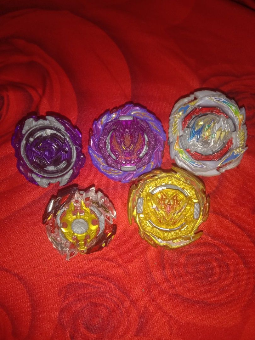 Beyblade Burst authentic takara tomy (Category: Action & Battle Toys) located in Manila. Submitted by fiercelion.e8ab19 (Listing ID 1433310283, Image 1). Description: Choose now! Revive pheonix (purple recolor), Roar Bahamut (recolor purple) Dynamite Belial (gold recolor) Gatling dragon, Legend spryzen! only limited stocks, buy now!.