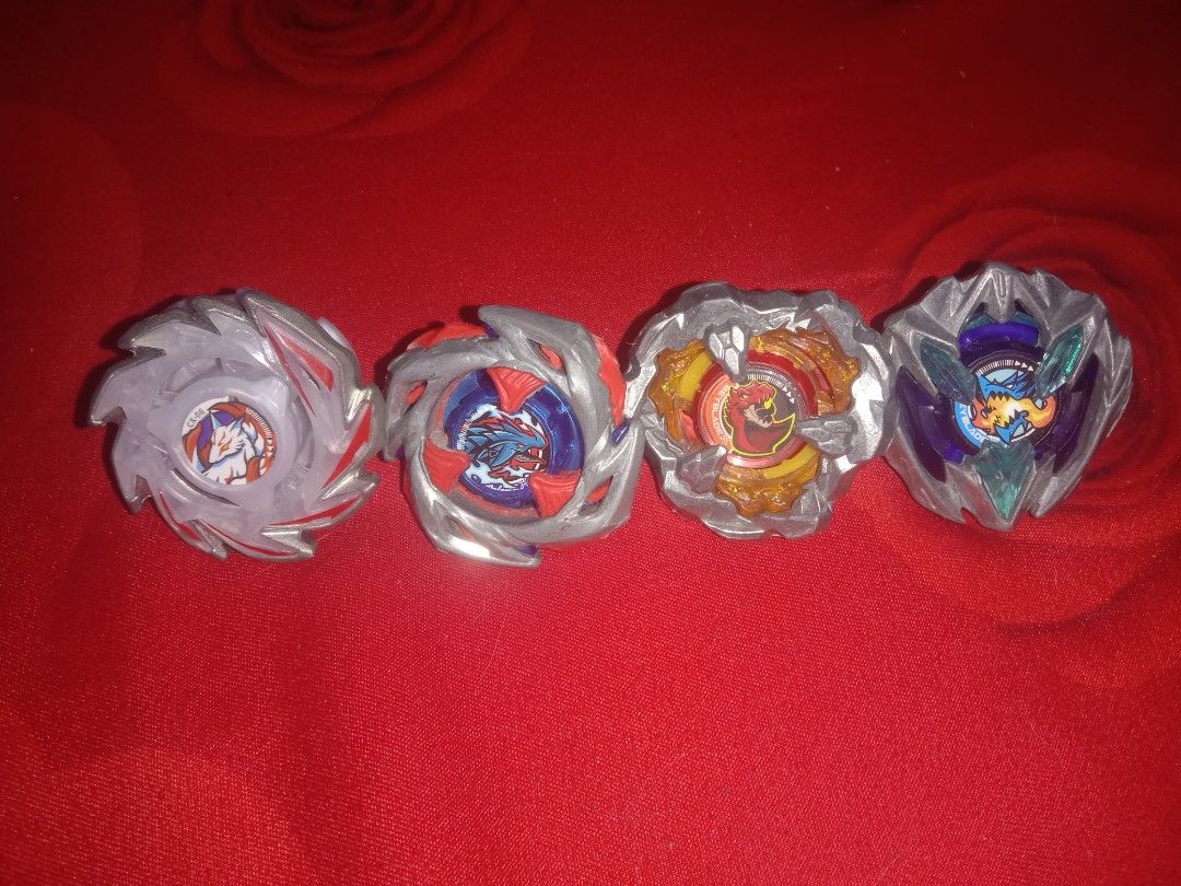 Beyblade Set of 4 (Category: Action & Battle Toys) located in Manila. Submitted by fiercelion.e8ab19 (Listing ID 1433314014, Image 1). Description: SET OF 4 AUTHENTIC TAKARA TOMY BEYBLADE X! LIMITED STOCKS ONLY, BUY NOW! 1. impact drake 960 lr 2. tyranno roar 170 level 3. Fox brush 970 gear rush 4. Dran buster 160 ball.