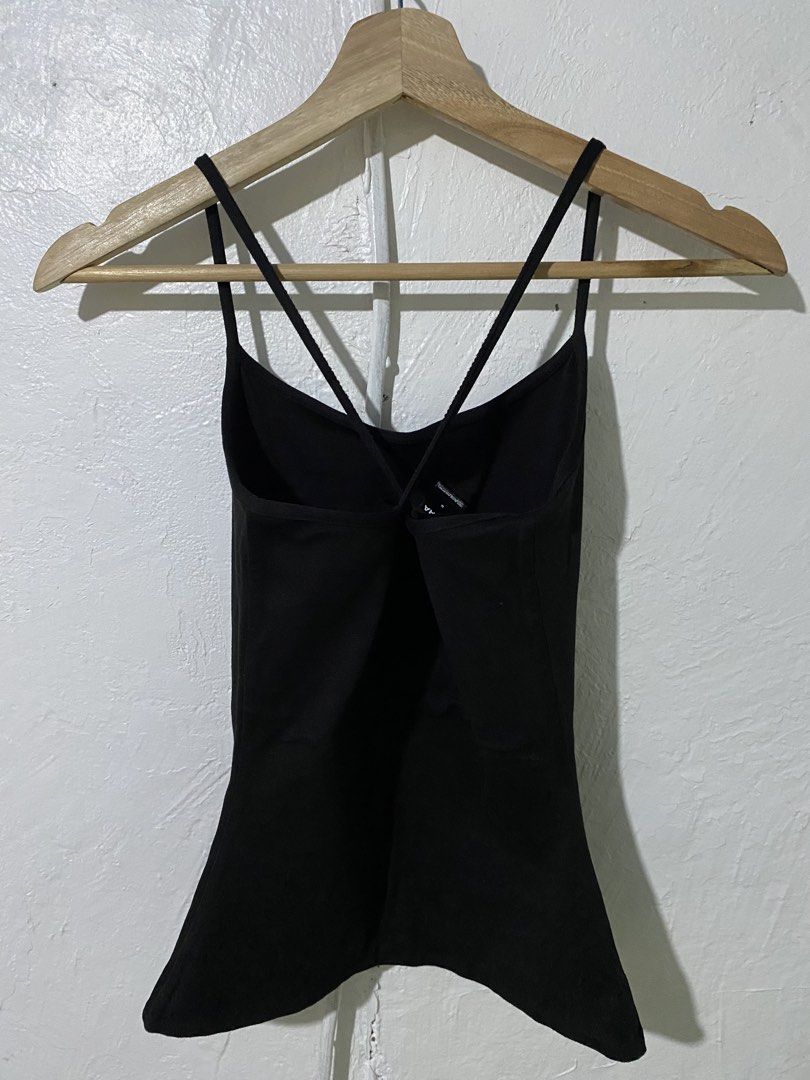 Black Cami Tank Top with Crisscross Back (Category: Sleeveless) located in Lucena. Submitted by alyckrmn (Listing ID 1433266959, Image 2). Description: - Black cami tank top - Crisscross back design - Thin spaghetti straps - Fitted silhouette - Smooth, stretchy fabric - Versatile for layering or wearing alone.