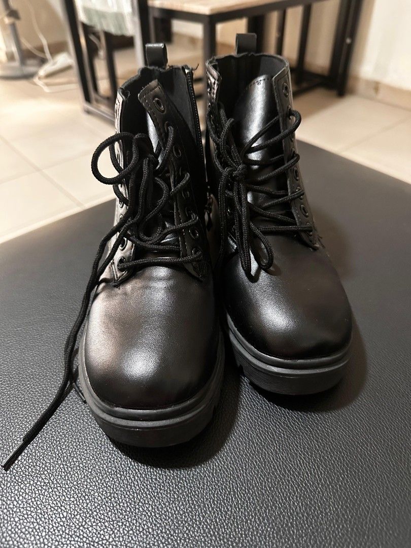 Black Combat Boots Womens' Fashionable Harajuku Motorcycle Shoes (Category: Boots) located in Singapore. Submitted by yoursereneface (Listing ID 1433212539, Image 1). Description: Measurements BELOW! Worn once indoors only. Faint creasing from try-on, barely noticeable. - Foot length: 23cm - Width: 21.95cm - Shaft: 15cm Selling because they don't fit :( Fits EU 36-37 / US 6..