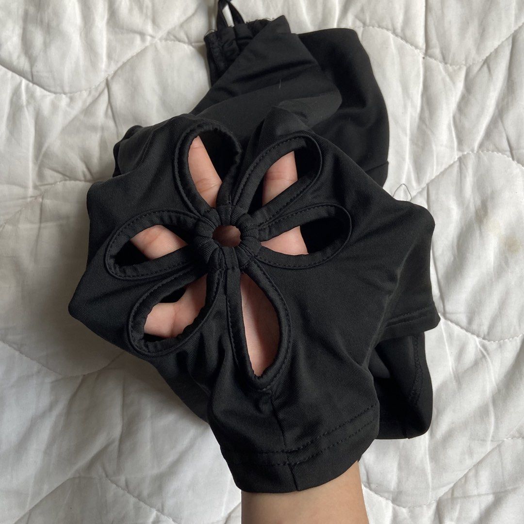 Black Halter Summer Side Cut-out top (Category: Sleeveless) located in Bulacan. Submitted by dumpcloset (Listing ID 1433297473, Image 2). Description: cute black halter top features side flower cut-out design. Perfect for summer! (NO when worn) ship via j&t loc bulacan .