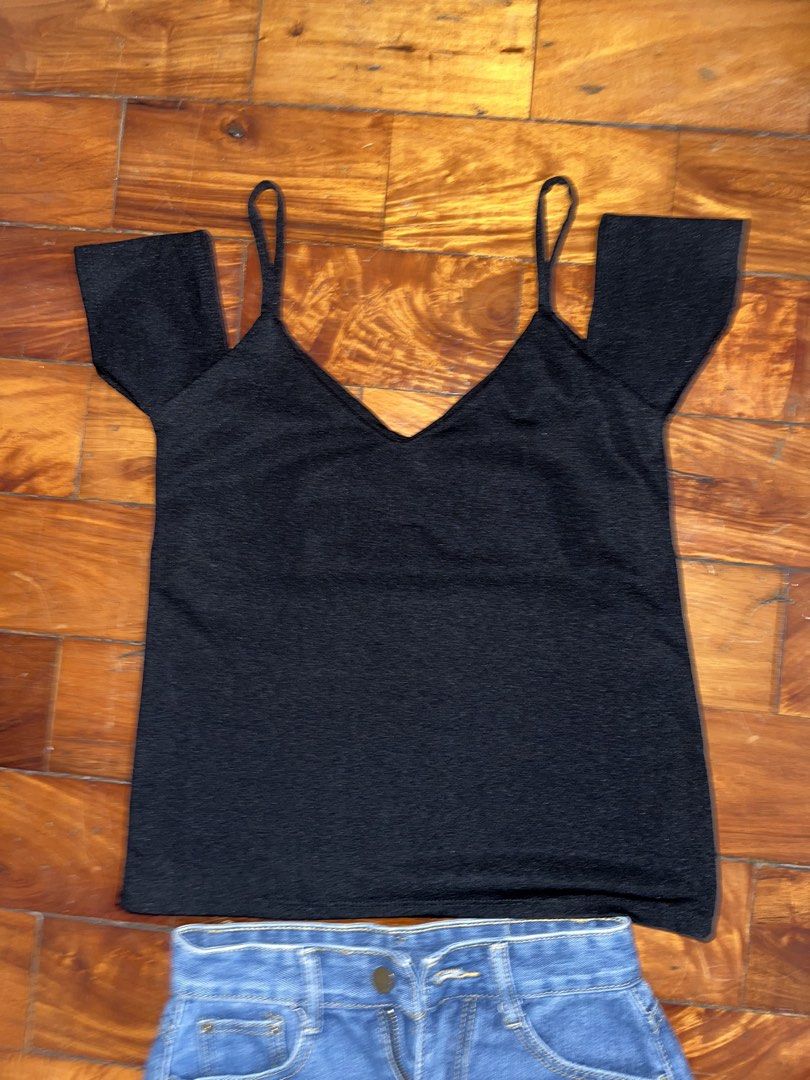 Black Top (Category: Blouses) located in Manila. Submitted by declitterclutter (Listing ID 1433262504, Image 2). Description: - Black V-neck top with spaghetti straps and short sleeves - Denim skirt with button and zipper closure - Classic design - Ideal for casual wear or going out.