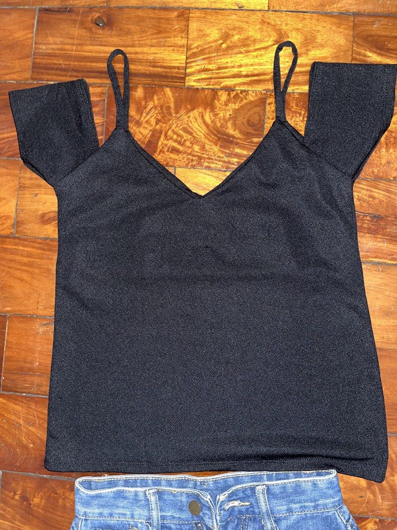 Black Top (Category: Blouses) located in Manila. Submitted by declitterclutter (Listing ID 1433262504, Image 3). Description: - Black V-neck top with spaghetti straps and short sleeves - Denim skirt with button and zipper closure - Classic design - Ideal for casual wear or going out.