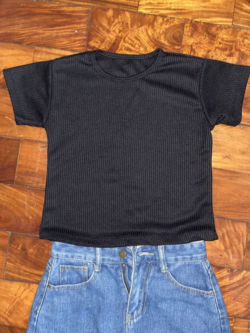 Black Waffle Top (Category: Blouses) located in Manila. Submitted by declitterclutter (Listing ID 1433262122, Image 3). Description: - Black ribbed top: - Short sleeves - Round neckline - No COD - Buyer will shoulder the shipping fee - Decluttering - Some thrifted finds - No to overpricing!! - No to haggling!!.