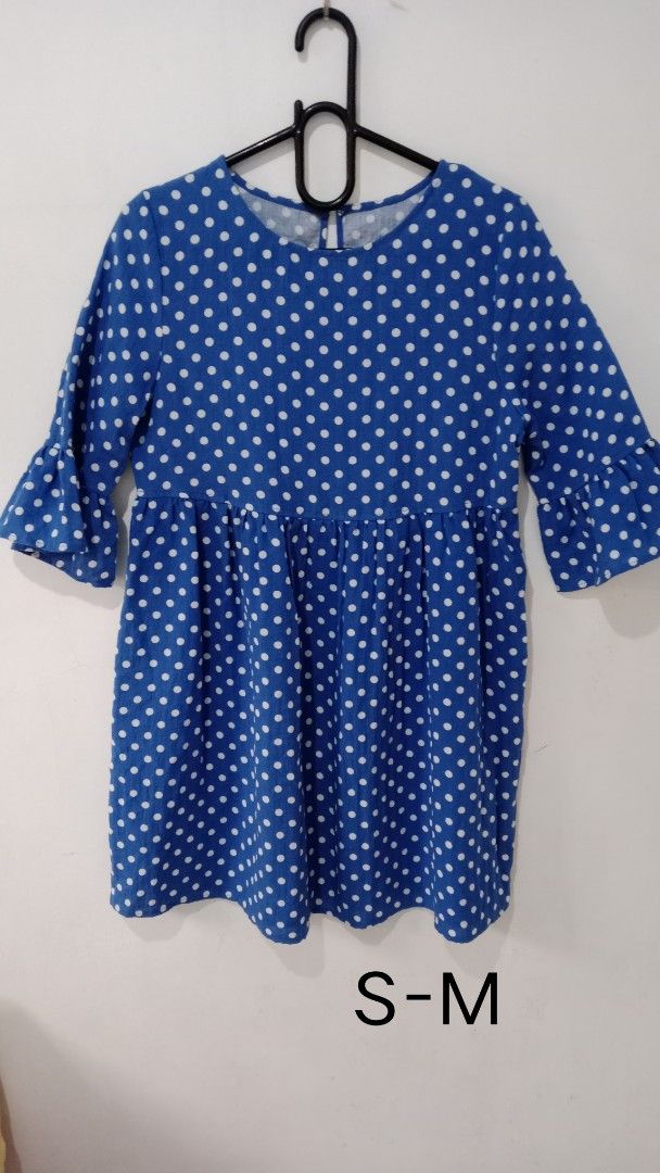 Blue Polka Dot Dress S-M (Category: Dresses) located in Sipalay. Submitted by brandeditemsatcheaprices (Listing ID 1433311622, Image 1). Description: - Blue dress with white polka dots - Round neckline - Three-quarter sleeves with flared cuffs - Gathered waist - Knee-length - Size: S-M.