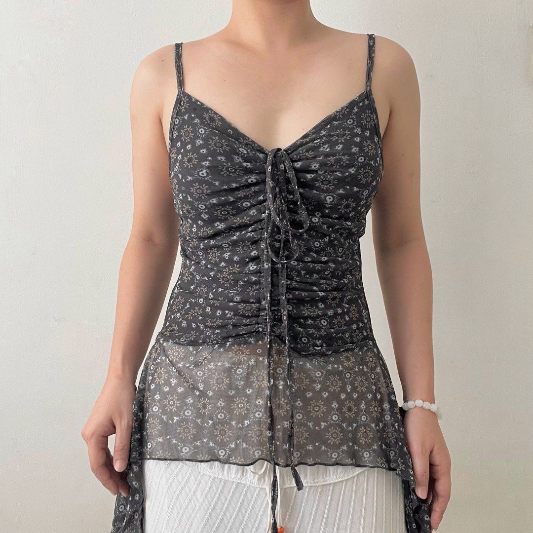 Bluish-green dark gray asymmetrical ruched top (Category: Sleeveless) located in Dagupan City. Submitted by rarus (Listing ID 1433293196, Image 3). Description: Bluish-green dark gray asymmetrical ruched top • Mesh material, Stretchy. • Fits v nice • Has lining Size: small to medium.