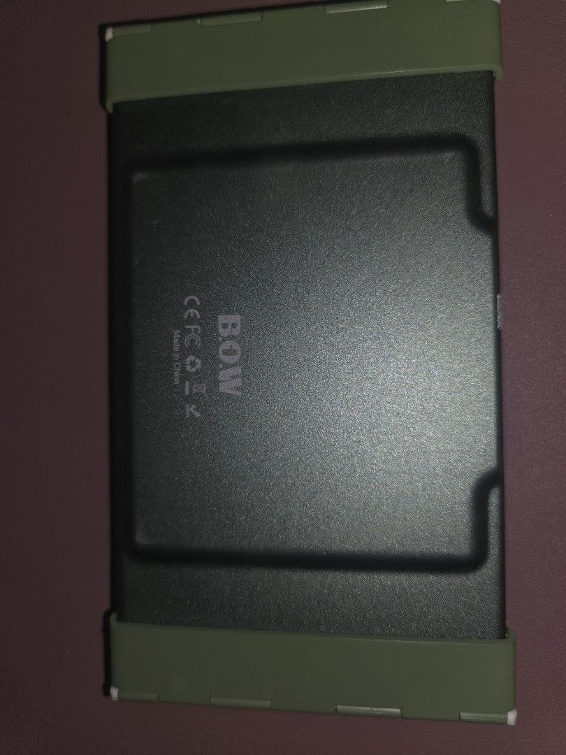 BOW Foldable Wireless Bluetooth Keyboard w/ Numpad (Category: Computer Keyboard) located in Quezon City. Submitted by algeaania (Listing ID 1433385050, Image 3). Description: BOW Foldable Bluetooth Keyboard - Tri-fold design for maximum portability - Compatible with iOS, Android, and Windows - Includes a numeric keypad - Made of lightweight and durable material - Stylish green-grey color - Folds for easy storage Inclusion: - Type C connector - Ke