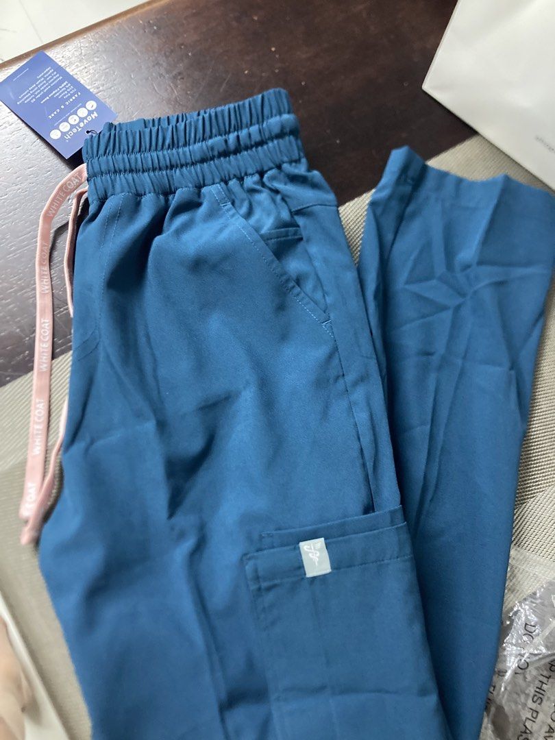White Coat Tapered MoveTech Scrub Pants - Women (Category: Other Bottoms) located in Tanauan. Submitted by philo.clutters (Listing ID 1433362749, Image 3). Description: - White Coat MoveTech scrub PANTS for women - Pacific tide color - Tapered fit - Drawstring waist - Multiple pockets - plastic and paper bag - Original price: P2,095 🏷️Selling for 1100!.