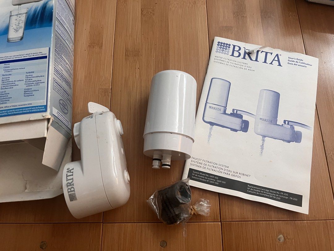 Brita Faucet Water Filtration System (Category: Water Purifiers & Dispensers) located in San Pablo. Submitted by posh_closet_cleanup (Listing ID 1433241294, Image 2). Description: - Brita faucet water filtration system - Reduces chlorine taste & odor, lead, and other impurities - Easy to install on standard faucets - Includes filter cartridge, faucet adapters, and washers - Filters up to 378 liters - Comes with user's guide * selling cheap becaus