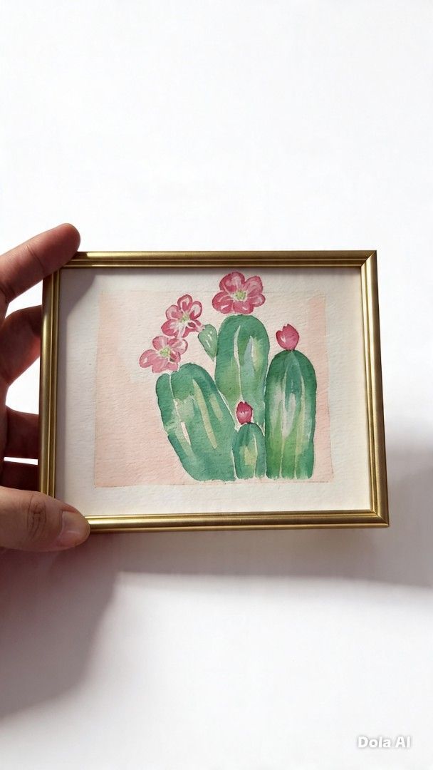 Cactus Watercolor Painting (Category: Art & Prints) located in Cavite. Submitted by joycreates (Listing ID 1433309798, Image 1). Description: - Hand-painted watercolor painting - Features a cactus with pink flowers - frame not included - Small size, perfect for any space - Adds a touch of nature.