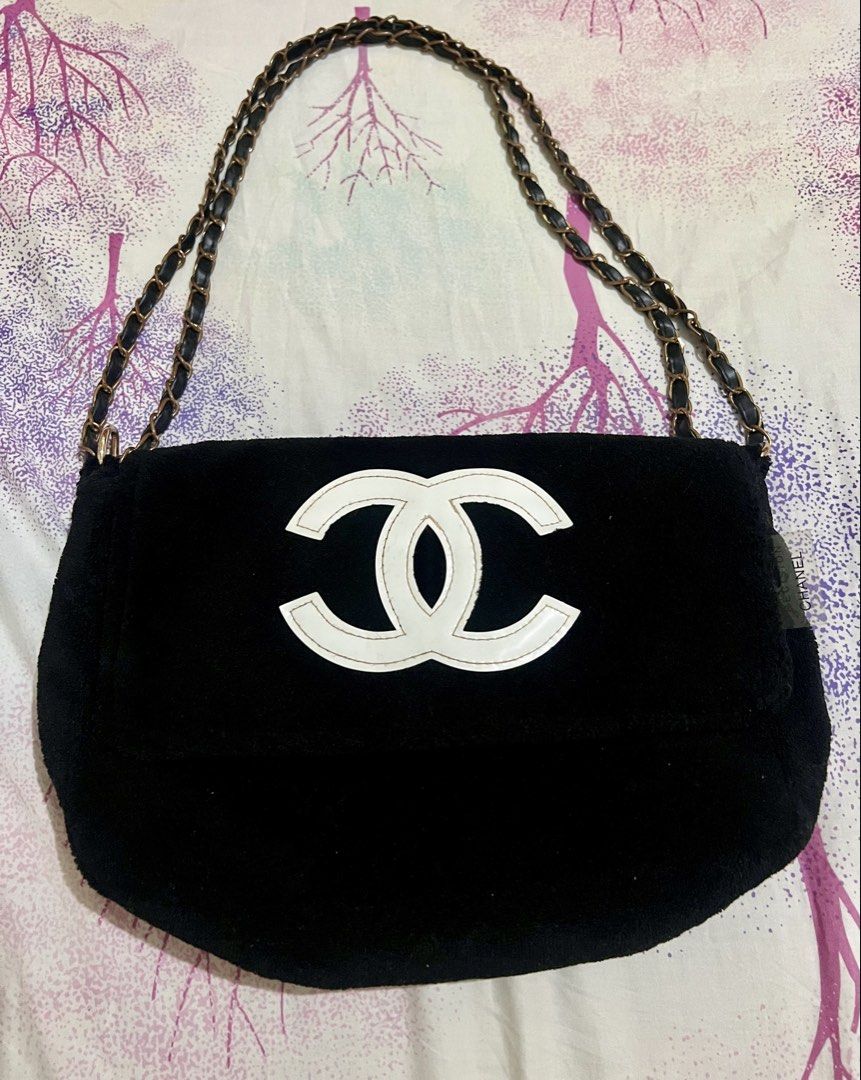 CHANEL VIP (Category: Luxury Bags & Wallets) located in Dagupan City. Submitted by casadebayongph (Listing ID 1433316321, Image 2). Description: - Black flap bag - White Chanel logo - Chain strap with leather detail - Interior pocket - Magnetic closure - Made of soft, plush material - Includes "PRECISION CHANEL" tag.