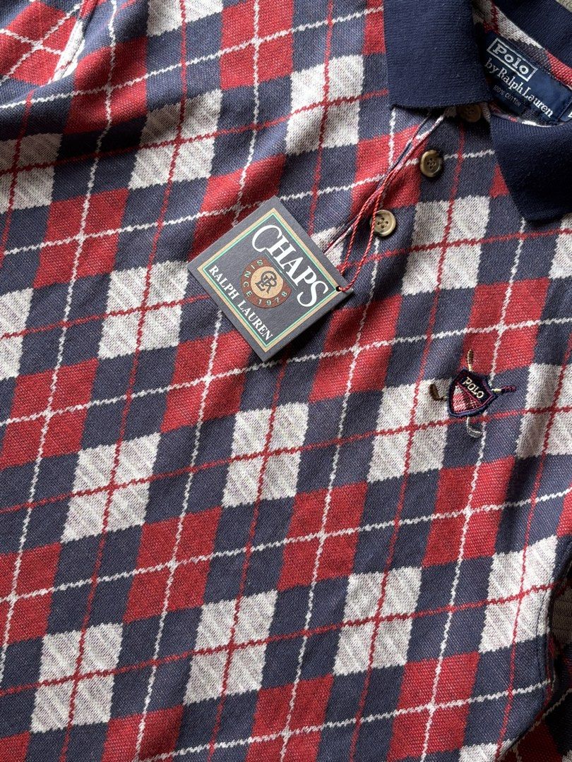 Chaps Ralph Lauren Argyle Polo Shirt (Category: Tshirts & Polo Shirts ) located in Bacolod City. Submitted by money_maker06 (Listing ID 1433325523, Image 3). Description: Chaps (Ralph Lauren) 🌳 •Comes with “Ralph Signature Design” 🍭 •Complete Details 💯 •Size: Medium •Width: 20 •Length: 28.5 in (Front) 30.5 at the (Back) •Condition: Good •Issue: Small Scratch 🖊️ •Price: 449 💰 •Click each picture to appreciate the item 📸 •Dm me if you’re inte