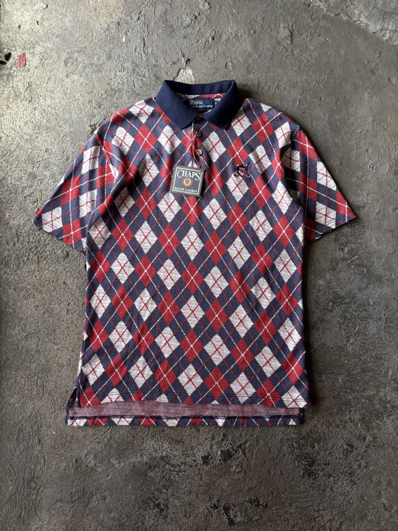 Chaps Ralph Lauren Argyle Polo Shirt (Category: Tshirts & Polo Shirts ) located in Bacolod City. Submitted by money_maker06 (Listing ID 1433325523, Image 1). Description: Chaps (Ralph Lauren) 🌳 •Comes with “Ralph Signature Design” 🍭 •Complete Details 💯 •Size: Medium •Width: 20 •Length: 28.5 in (Front) 30.5 at the (Back) •Condition: Good •Issue: Small Scratch 🖊️ •Price: 449 💰 •Click each picture to appreciate the item 📸 •Dm me if you’re inte