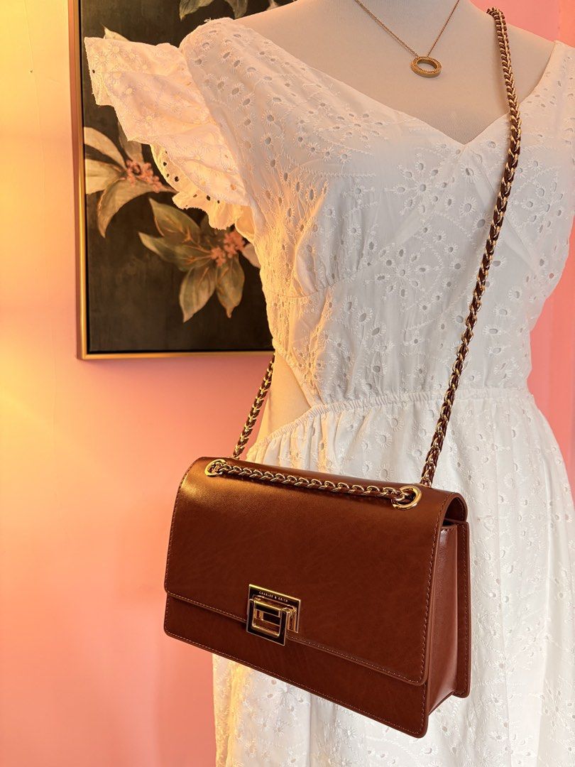 CHARLES AND KEITH TAN BAG MESSENGER TYPE OR SHOULDER BAG (Category: Shoulder Bags) located in Davao. Submitted by flamingopark (Listing ID 1433288587, Image 1). Description: FOR SALE✅ USED ONCE. BOUGHT IN DUBAI. No issue at anything in the bag. RFS—decluttering season! ₱2,000. BOUGHT THIS ROUGLY AROUND 5K in DUBAI. This is good for this upcoming summer getaways! .