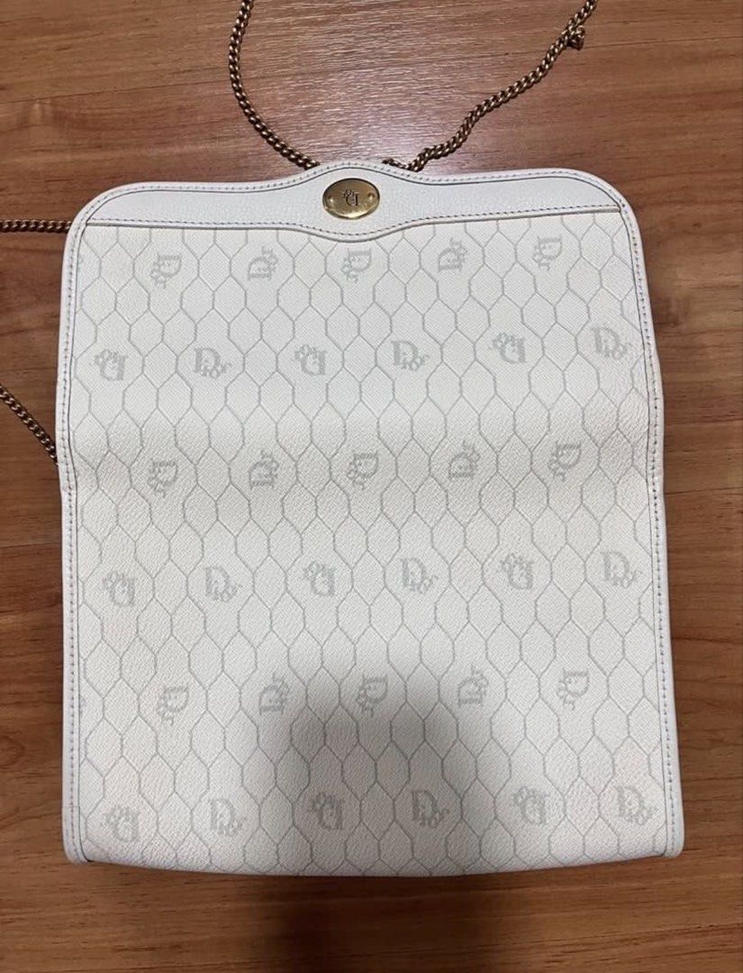 Christian Dior White Crossbody Bag (Category: Luxury Bags & Wallets) located in Manila. Submitted by leanne.closet (Listing ID 1433252109, Image 3). Description: Vintage Christian Dior bag owned by my grandmother. This was bought from USA in the 1990s. The external leather material is still in very good condition, no signs of cracks. The interior has some leather cracks (pls see pics for reference). Aside from the interior leather cracks, no othe