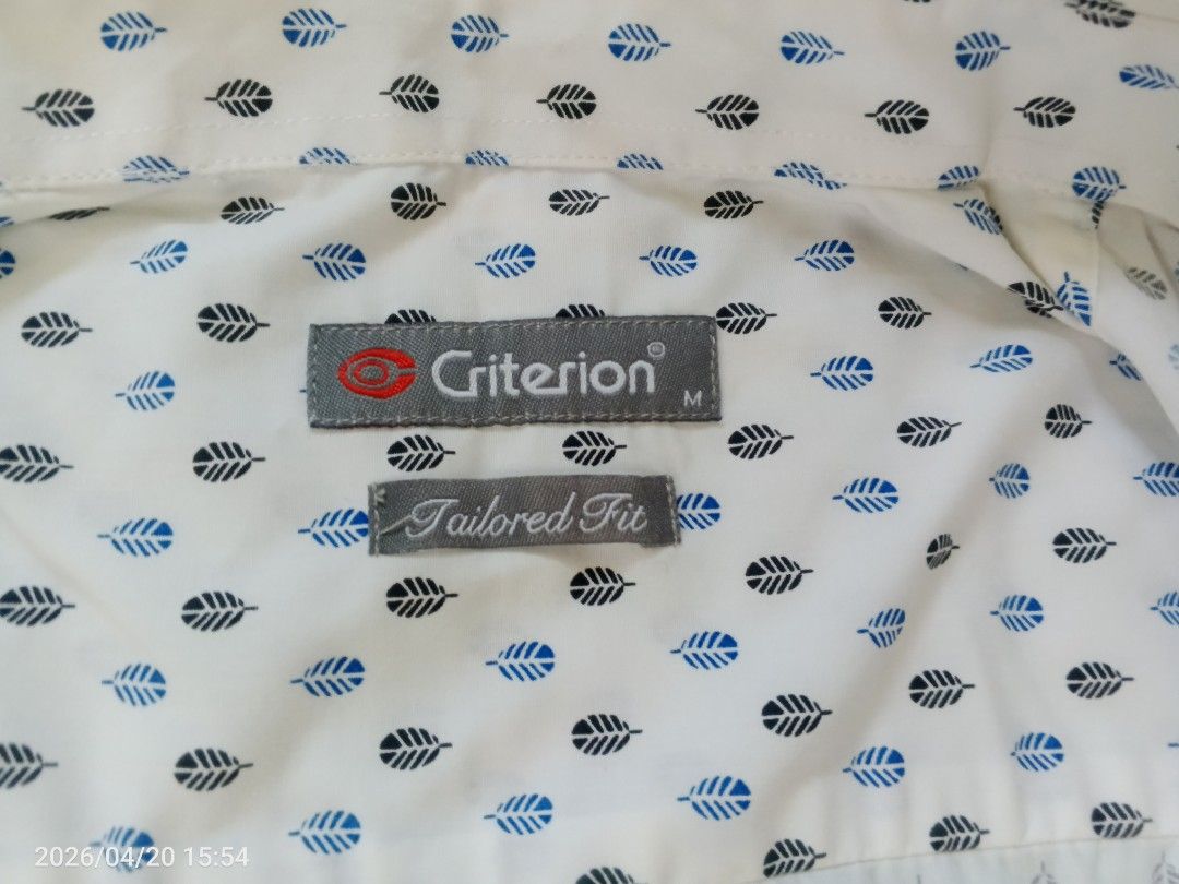 Criterion Tailored Fit Shirt (Category: Tshirts & Polo Shirts ) located in Manila. Submitted by AngelsPreloved (Listing ID 1433312335, Image 3). Description: - Criterion white short-sleeved shirt - Small dot pattern - Tailored fit - Size: M - Button-down front - Collar - Perfect for casual wear.