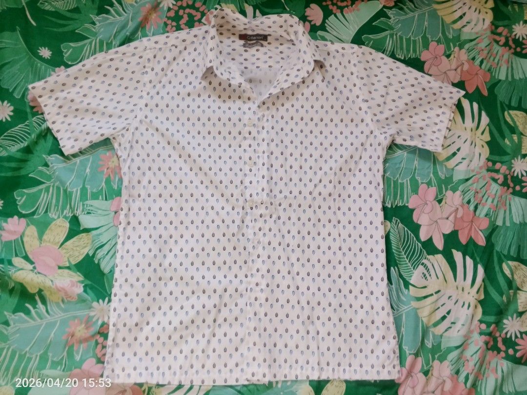 Criterion Tailored Fit Shirt (Category: Tshirts & Polo Shirts ) located in Manila. Submitted by AngelsPreloved (Listing ID 1433312335, Image 1). Description: - Criterion white short-sleeved shirt - Small dot pattern - Tailored fit - Size: M - Button-down front - Collar - Perfect for casual wear.