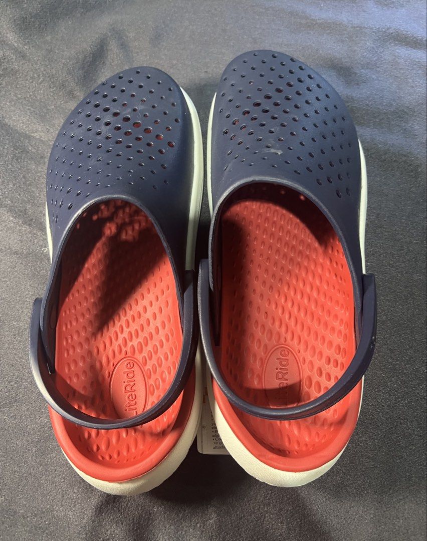 Crocs InMotion LiteRide Unisex Clogs (Navy Blue & Red) (Category: Flats & Sandals) located in Makati City. Submitted by luvssnya (Listing ID 1433377463, Image 2). Description: - Includes original tag - Includes crocs bag - Brand New size: men’s 7/women’s 9 mop: gcash/bank transfer mod: lalamove/grab.
