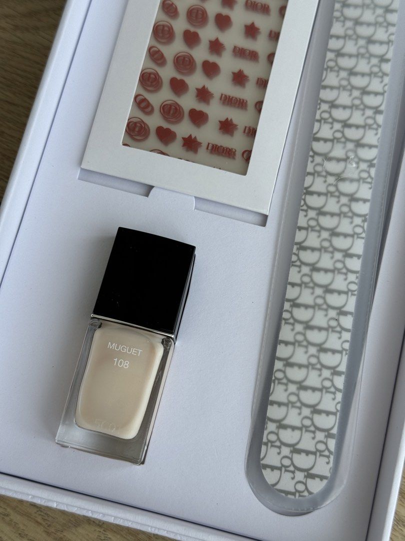 Dior Nail Polish gift set (Category: Hands & Nails) located in Mandaluyong City. Submitted by clearanceaa (Listing ID 1433249685, Image 2). Description: Nail polish in shade: muget Comes with nail file and nail stickers. Comes with paper bag. .