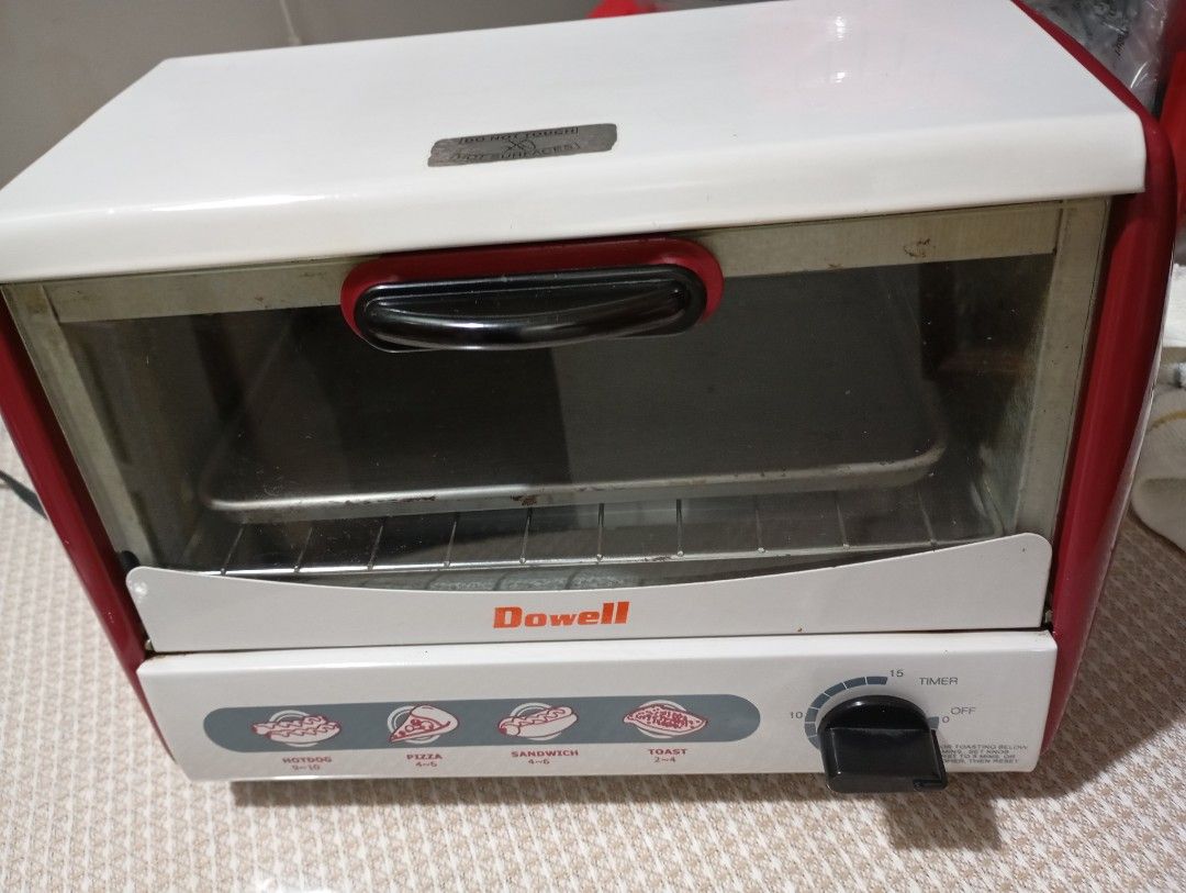 Dowell Oven Toaster DOT-603 (Category: Ovens & Toasters) located in Valenzuela. Submitted by shoppedemiel (Listing ID 1433313105, Image 1). Description: - Dowell DOT-603 Oven Toaster - Cooking Settings: Hotdog, Pizza, Sandwich, Toast - Features a convenient timer - Stylish red and white design - Includes: Baking tray and wire rack - Power: 650W, 230V a.c..