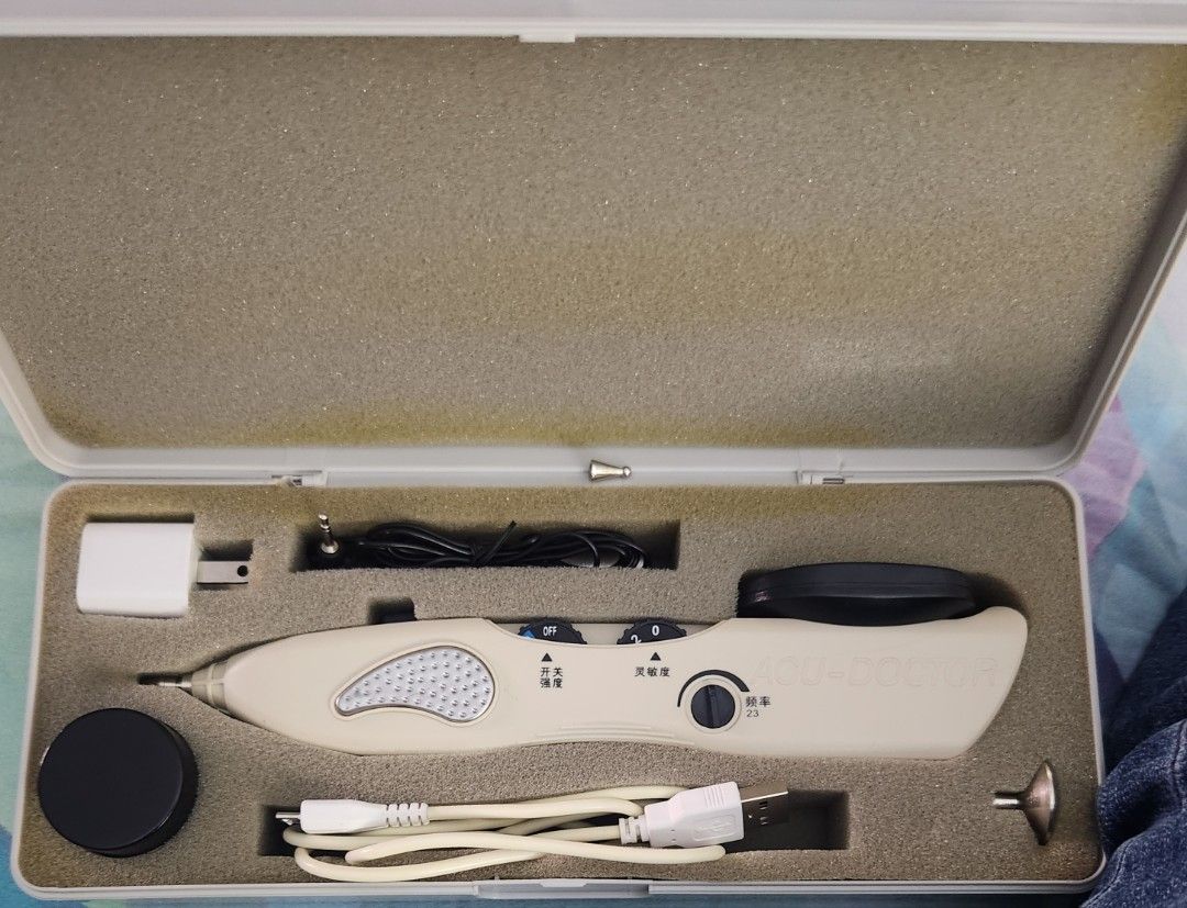 Electro Acupuncture Device LY-508B (Category: Medical Supplies & Tools) located in Manila. Submitted by 09212011221 (Listing ID 1433307648, Image 2). Description: Electro Acupuncture Device, model LY-508B, comes with a carrying case, charger, and accessories. It includes a user manual with instructions and a diagram of acupuncture points. The device features an ON/OFF & strength level knob, sensitivity level knob, and digital display. It also has