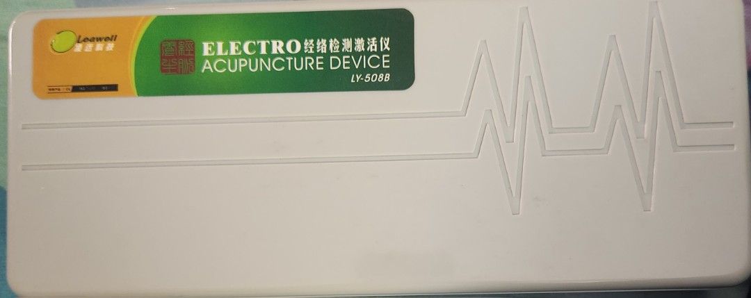 Electro Acupuncture Device LY-508B (Category: Medical Supplies & Tools) located in Manila. Submitted by 09212011221 (Listing ID 1433307648, Image 1). Description: Electro Acupuncture Device, model LY-508B, comes with a carrying case, charger, and accessories. It includes a user manual with instructions and a diagram of acupuncture points. The device features an ON/OFF & strength level knob, sensitivity level knob, and digital display. It also has