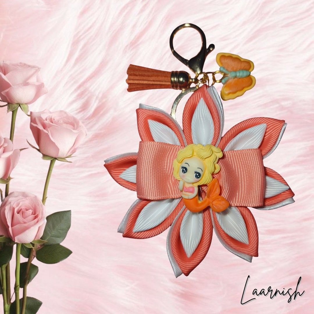 Flower Keychain (Category: Handmade Craft) located in Santa Rosa. Submitted by laarnish (Listing ID 1433261609, Image 1). Description: These eye-catching keychain add a touch of whimsy and personality to any bag. 🌺 Handmade Accessories! 🌺 Color may slightly differ due to lighting. .